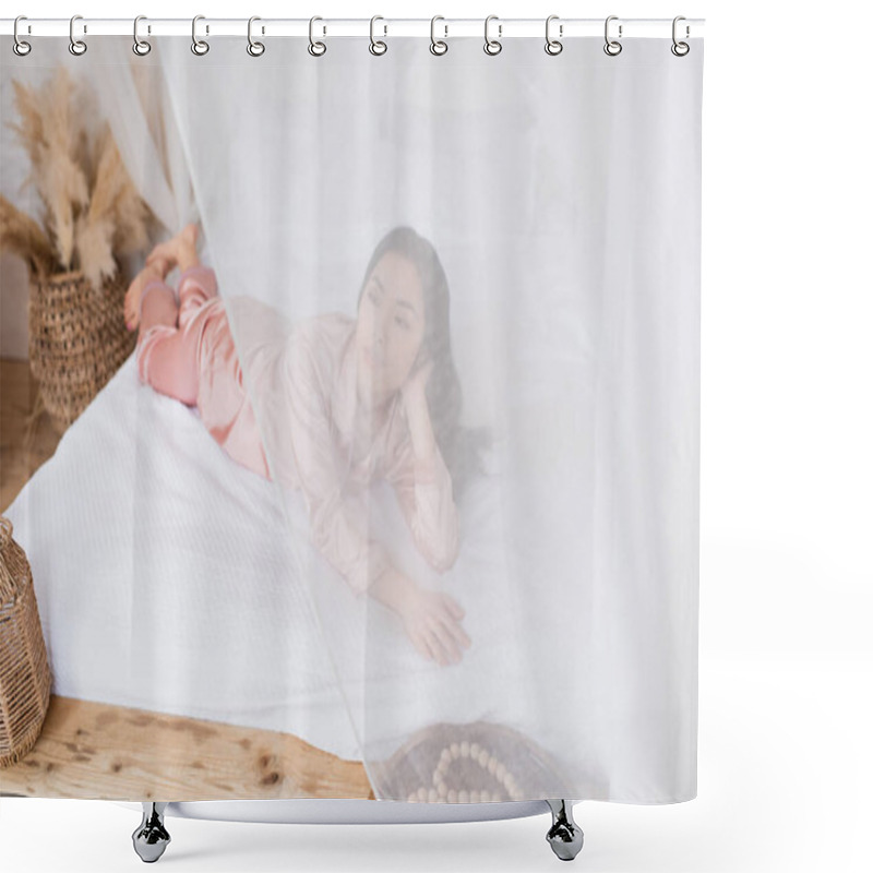 Personality  Young Asian Woman In Silk Pajamas Lying Outside Curtain On White Linen In Bedroom Shower Curtains