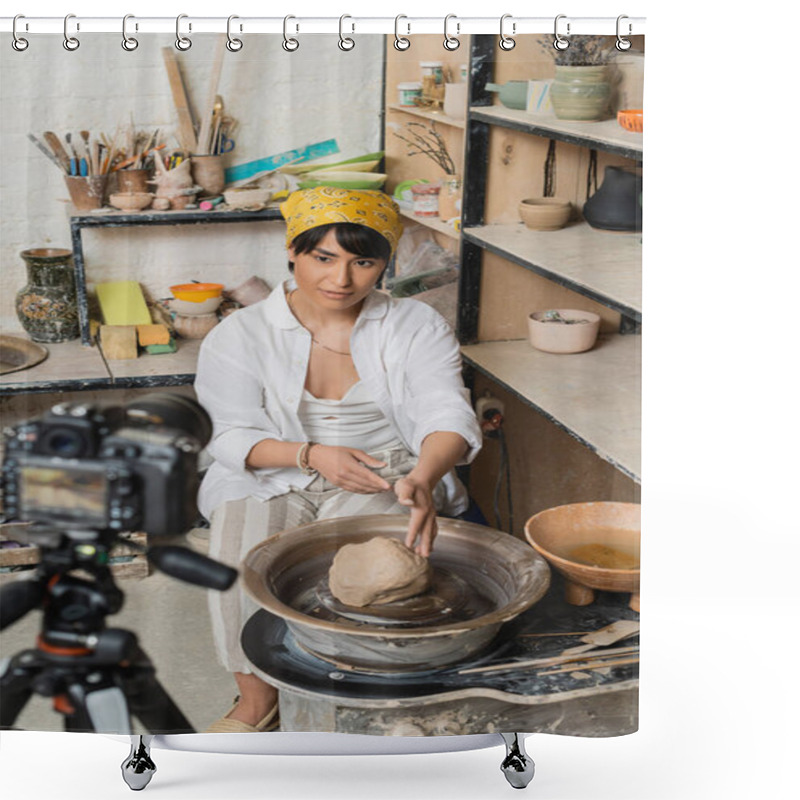 Personality  Young Asian Female Artist In Headscarf And Workwear Looking At Digital Camera While Sitting Near Clay On Pottery Wheel In Ceramic Workshop At Background, Pottery Artist Showcasing Craft Shower Curtains