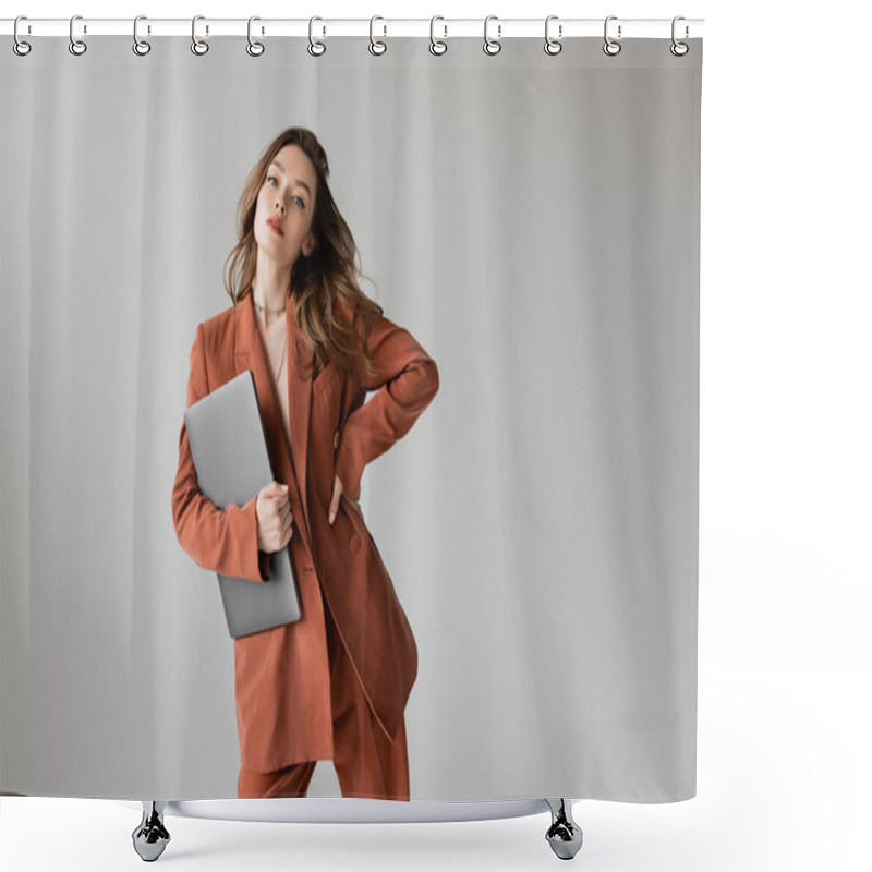 Personality  Fashionable Freelancer With Brunette Hair In Terracotta And Trendy Suit With Blazer And Pants, Holding Laptop While Standing With Hand On Hip On Grey Background, Looking Camera, Young Woman, Remote Work  Shower Curtains