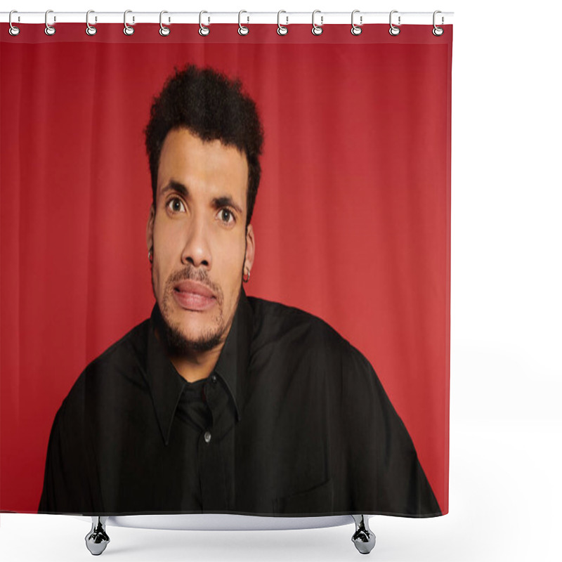 Personality  A Young, Confident Man With A Playful Look Stands Against A Bright Red Background. Shower Curtains