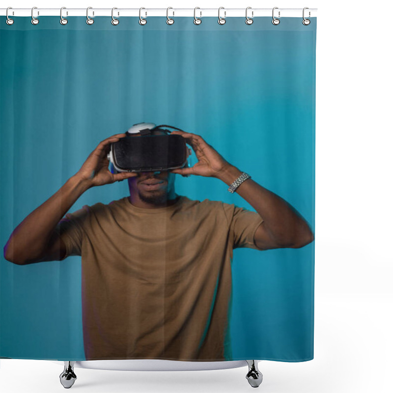 Personality  In A Futuristic Visual, An African American Man Stands Isolated Against A Striking Blue Backdrop, Adorned With VR Glasses That Transport Him Into A Cutting-edge Virtual Reality Experience, Merging Shower Curtains