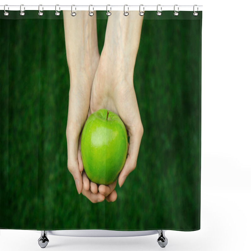 Personality  Vegetarians And Fresh Fruit And Vegetables On The Nature Of The Theme: Human Hand Holding A Green Apple On A Background Of Green Grass Top View Shower Curtains