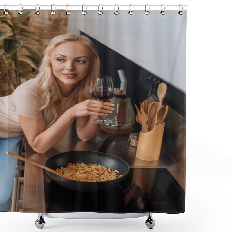 Personality  High Angle View Of Smiling Woman With Glass Of Red Wine Standing Near Wok With Thai Noodles And Looking Away Shower Curtains