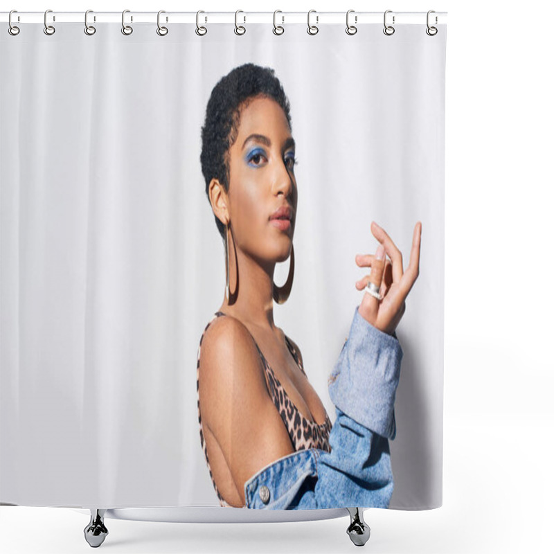 Personality  Trendy African American Woman With Short Hair And Vivid Eyeshadow Posing In Top With Animal Print And Denim Jacket While Standing On Grey Background, Denim Fashion Concept Shower Curtains