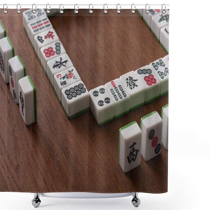 Personality  KYIV, UKRAINE - JANUARY 30, 2019: Frame And Rows Of Mahjong Game Tiles On Wooden Surface Shower Curtains