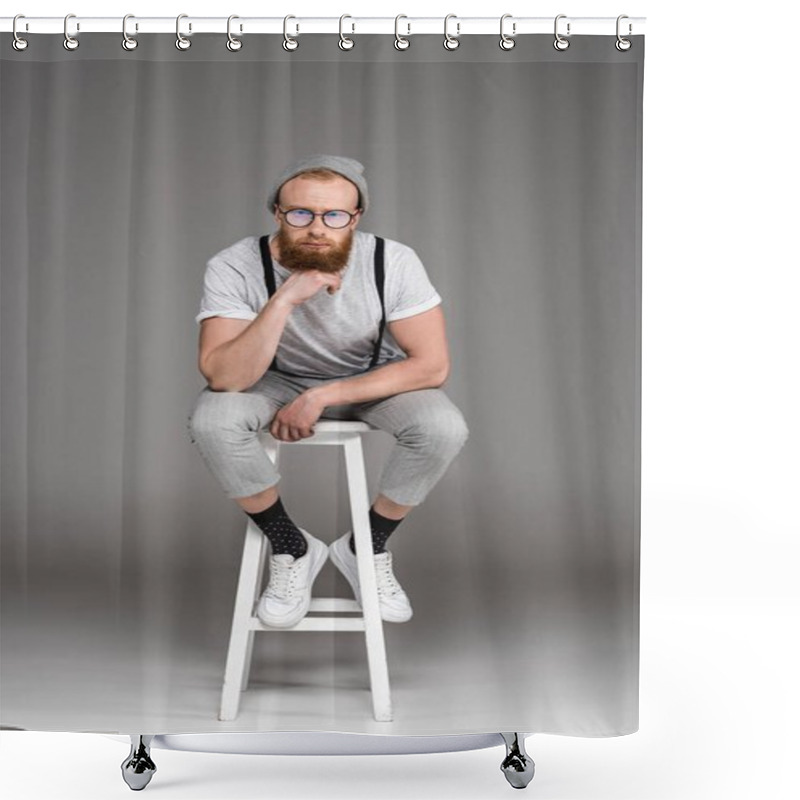 Personality  Stylish Bearded Man In Eyeglasees Sitting On Stool And Looking At Camera On Grey   Shower Curtains