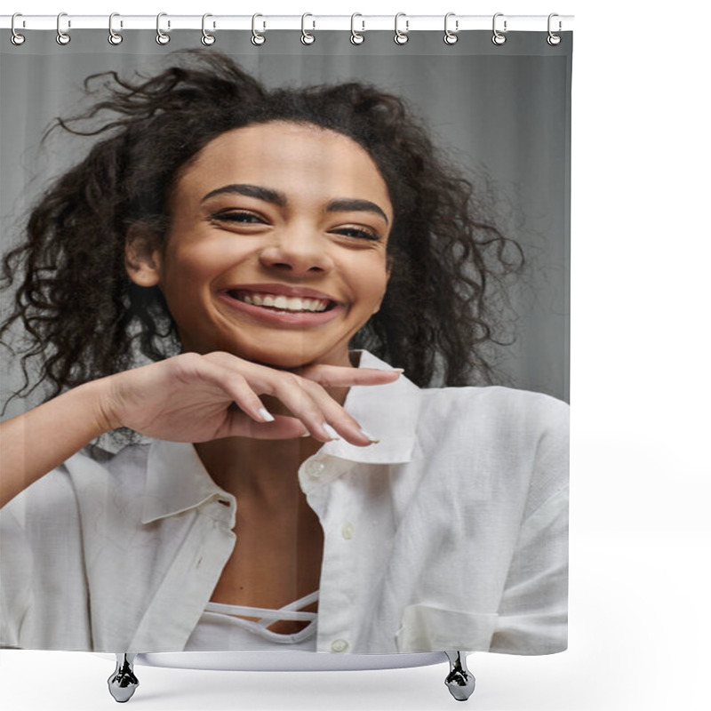 Personality  A Young Woman With Curly Hair Smiles Brightly While Posing Against A Grey Background. Shower Curtains