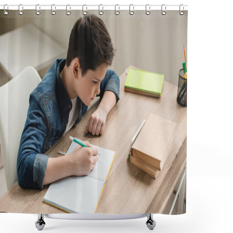 Personality  High Angle View Of Attentive Boy Writing In Copy Book While Doing Schoolwork At Home Shower Curtains