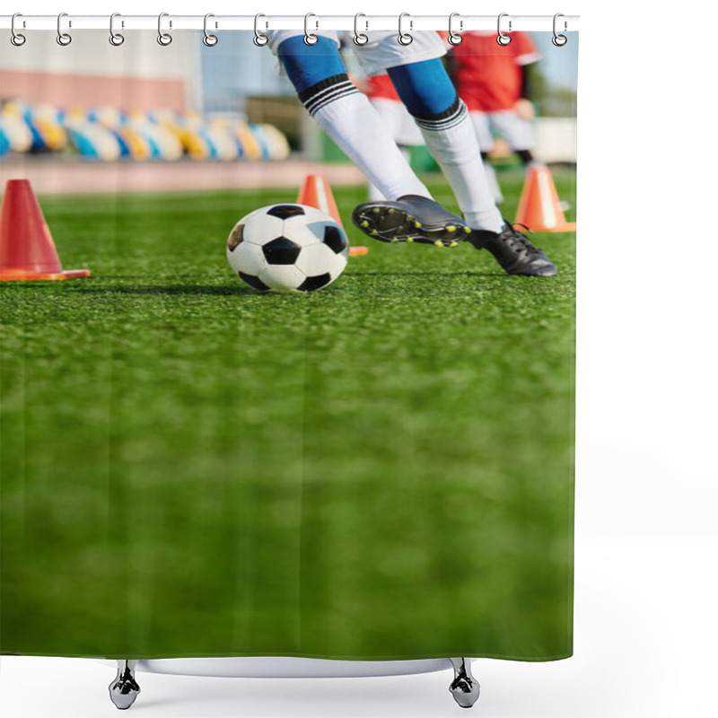 Personality  A Person Wearing Athletic Gear Is Kicking A Soccer Ball On A Green Field Under A Clear Blue Sky On A Sunny Day. Shower Curtains