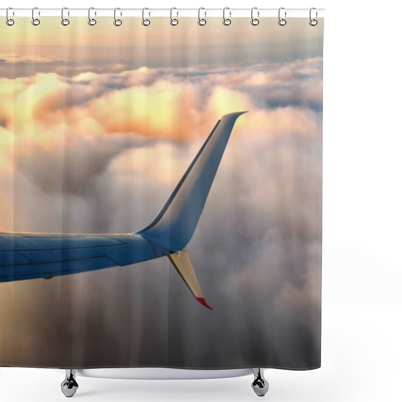 Personality  Landscape View Of The Curved Wing Tip Of An Aircraft Climbing Above Clouds In Early Morning Light Shower Curtains