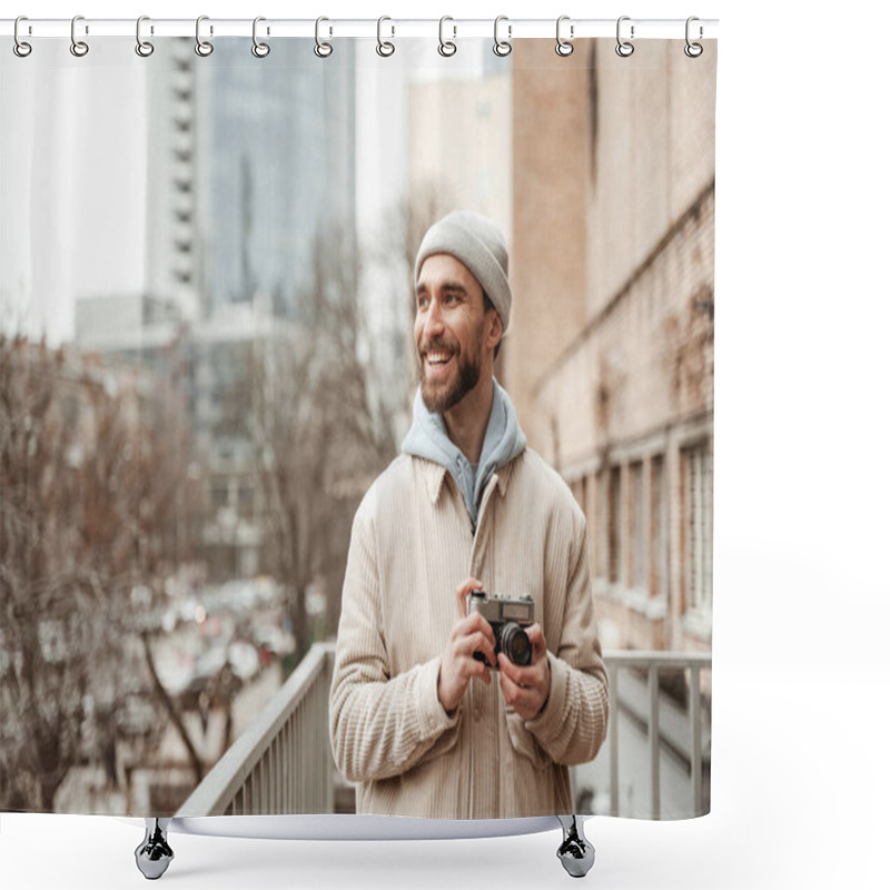 Personality  Bearded Man In Beanie Hat And Jacket Smiling While Holding Retro Camera  Shower Curtains