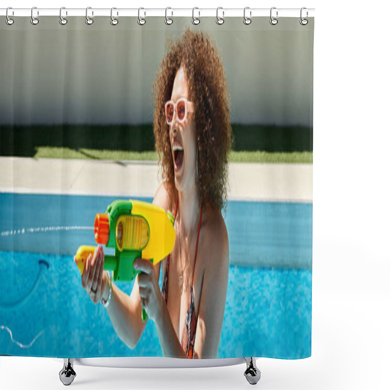 Personality  A Woman With Curly Hair Wearing A Bikini Enjoys A Sunny Day By The Pool, Playfully Aiming A Water Gun. Shower Curtains