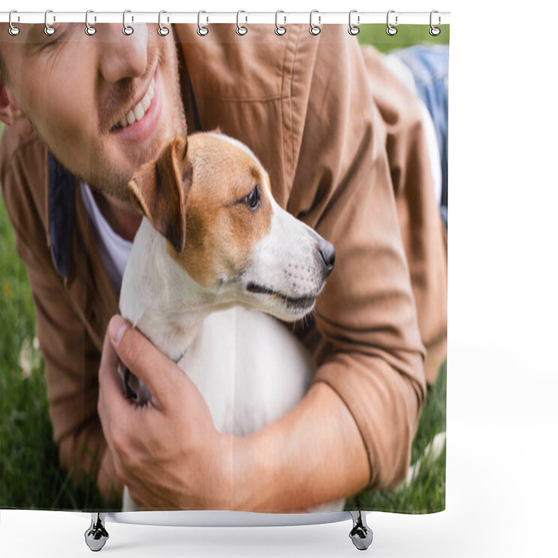 Personality  Cropped View Of Man Cuddling Jack Russell Terrier Dog While Lying On Green Lawn Shower Curtains