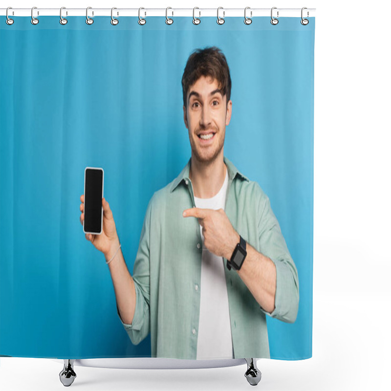 Personality  Happy Young Man Pointing At Smartphone With Blank Screen On Blue Shower Curtains