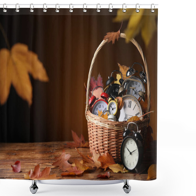 Personality  Alarm Clocks And Dry Leaves In Wicker Basket On Wooden Table Against Brown Background, Space For Text Shower Curtains