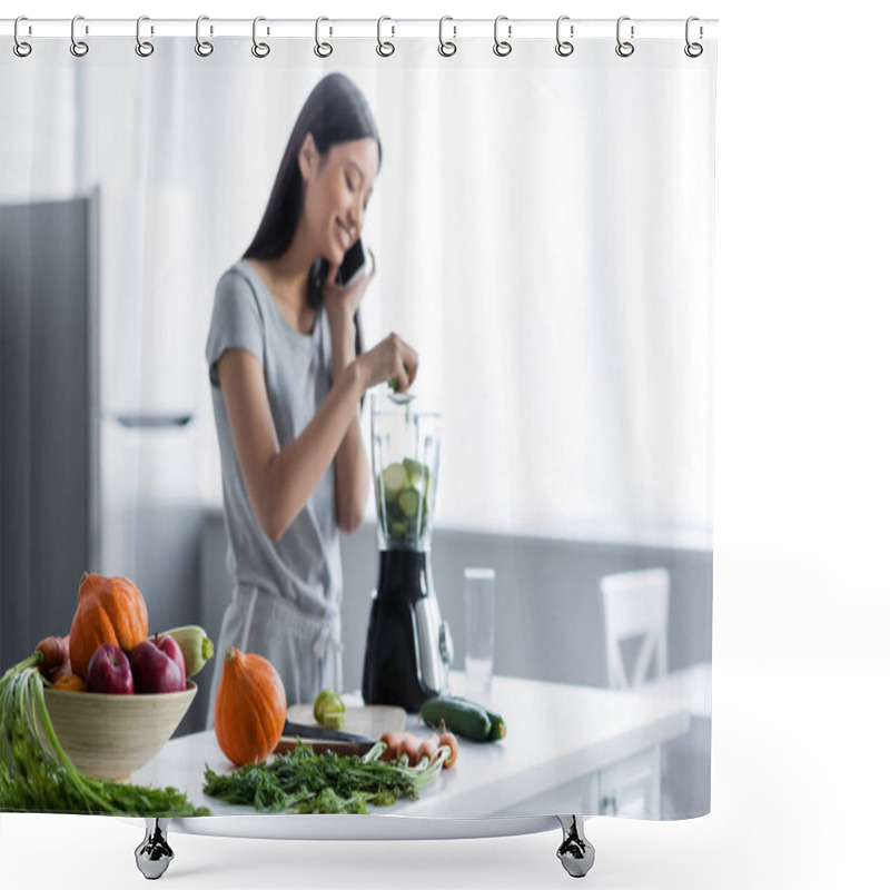 Personality  Blurred Asian Woman Talking On Cellphone Near Fresh Vegetables And Electric Shaker In Kitchen Shower Curtains