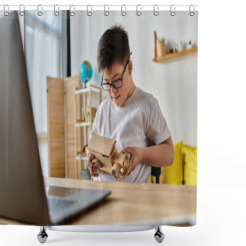 Personality  A Boy With Down Syndrome Sits Diligently At A Desk, Focusing On His Laptop. Shower Curtains