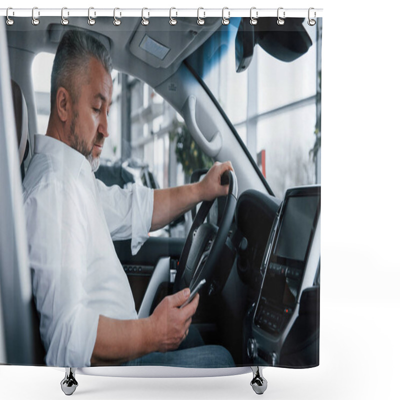 Personality  In The Auto Saloon. Using Mobile Phone. Businessman Sits In The Modern Car And Have Some Deals. Shower Curtains