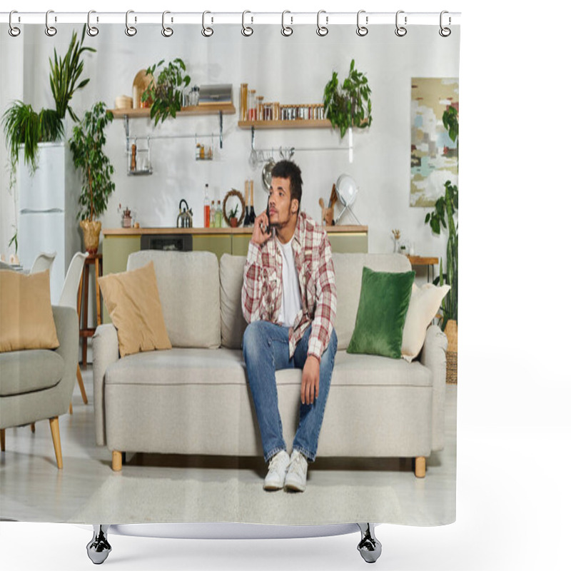 Personality  Man Sitting Comfortably On A Sofa, Engaged In A Phone Conversation In A Modern Living Space. Shower Curtains