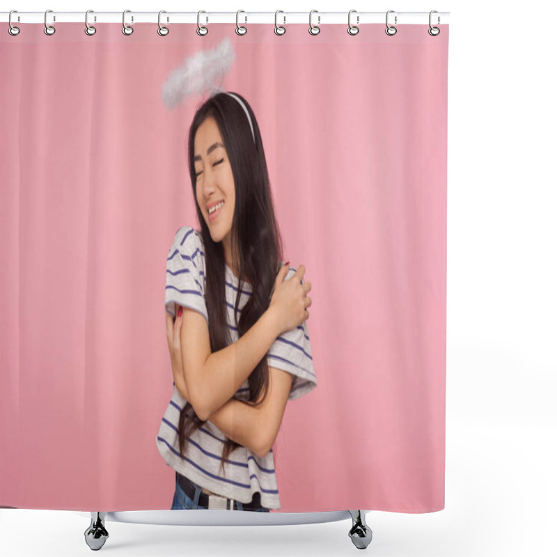 Personality  Portrait Of Amazing Angelic Girl With Long Brunette Hair And Halo Over Head Smiling Contentedly And Hugging Herself, Concept Of Self-love, Support. Indoor Studio Shot Isolated On Pink Background Shower Curtains