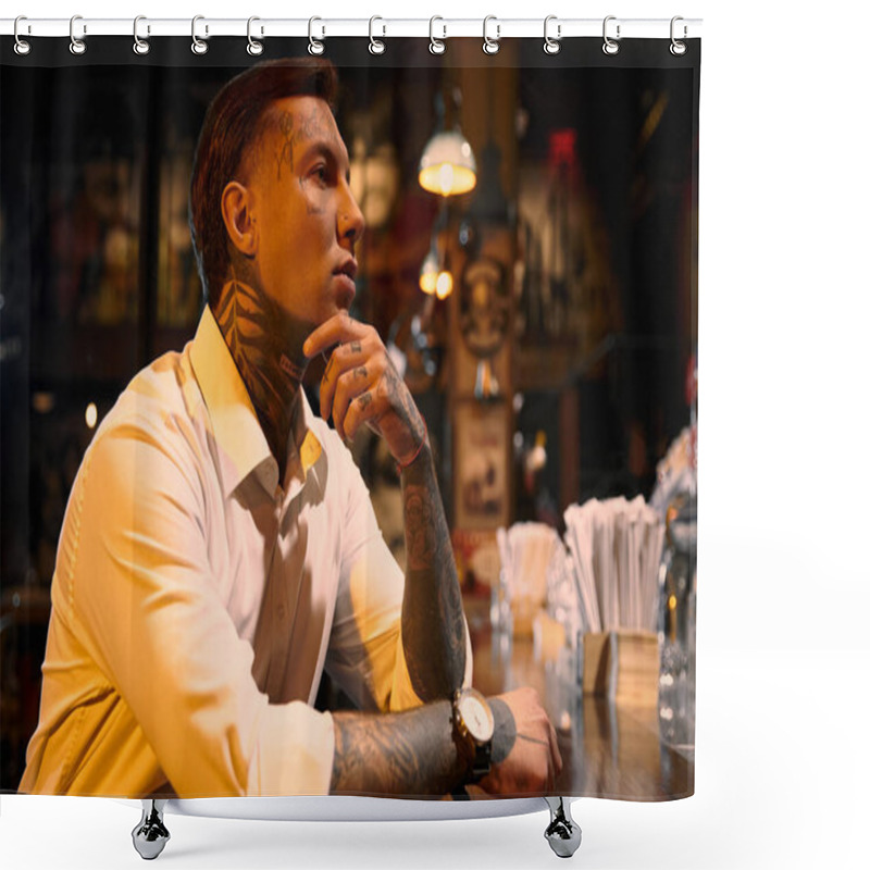 Personality  A Young Man With Striking Tattoos Sits Thoughtfully At A Bar, Embracing The Evening Vibe. Shower Curtains