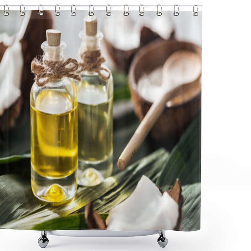 Personality  Selective Focus Of Bottles With Coconut Oil Near Cracked Coconuts On Green Palm Leaves Shower Curtains