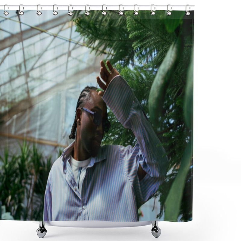 Personality  A Stylish African American Man Stands In A Greenhouse, Holding His Hand To His Head. Shower Curtains