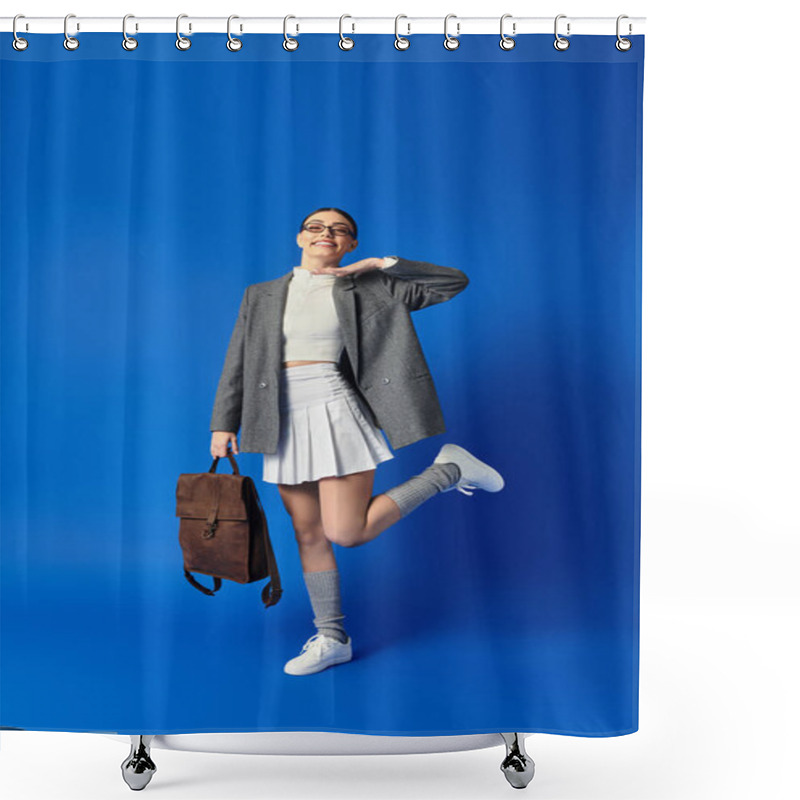 Personality  A Joyful Young Woman Strikes A Playful Pose While Holding A Backpack, Showcasing Her Trendy Style. Shower Curtains