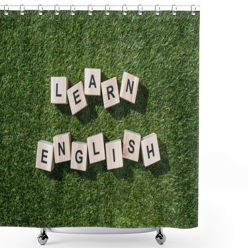 Personality  Top View Of Learn English Inscription Made Of Wooden Blocks On Green Grass Shower Curtains