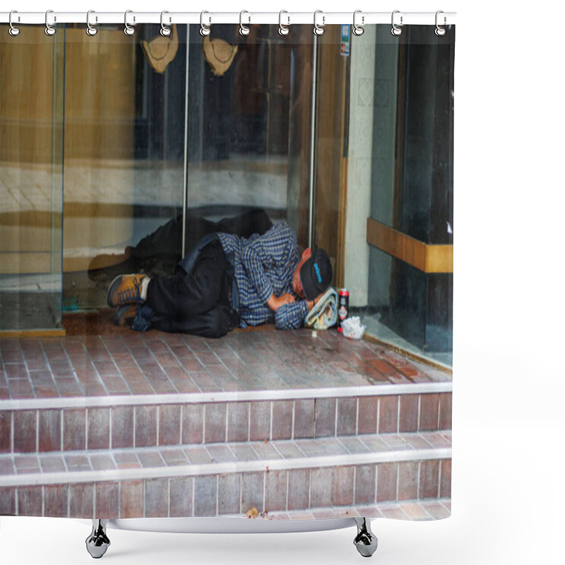 Personality  Perigueux, France September 02 2023 : A Stark Contrast: Homeless Individual Rests Outside Closed Shop. Shower Curtains