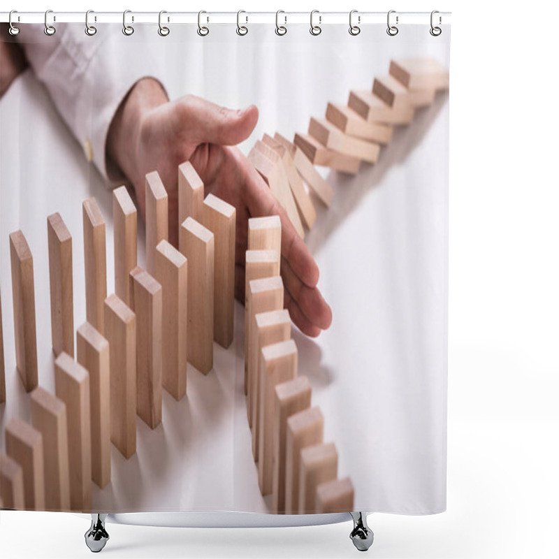 Personality  Close-up Of A Businessperson's Hand Stopping Wooden Blocks From Falling On White Background Shower Curtains