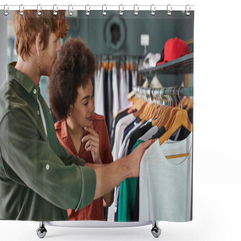 Personality  Smiling Young African American Craftswoman Looking At Clothes On Hangers While Standing Near Redhead Colleague In Blurred Print Studio, Young Small Business Owners Concept  Shower Curtains