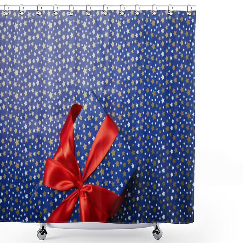 Personality  Top View Of Wrapped Gift Box With Red Ribbon On Festive Wrapping Paper With Stars Pattern Shower Curtains