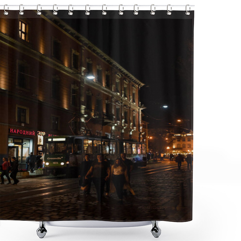 Personality  LVIV, UKRAINE - OCTOBER 23, 2019: Tram Near People Walking On Street In Evening  Shower Curtains