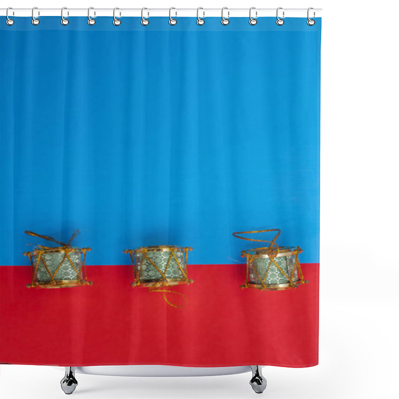 Personality  Three Beautifully Arranged Traditional Xmas Decorative Drums Set Against A Vibrant Blue And Red Background, Perfect For Holiday Celebrations, Cultural Designs, And Seasonal Decorations. Shower Curtains