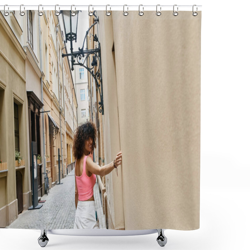 Personality  A Stylish Woman With Curly Hair Explores A Narrow Alleyway In A European City. Shower Curtains