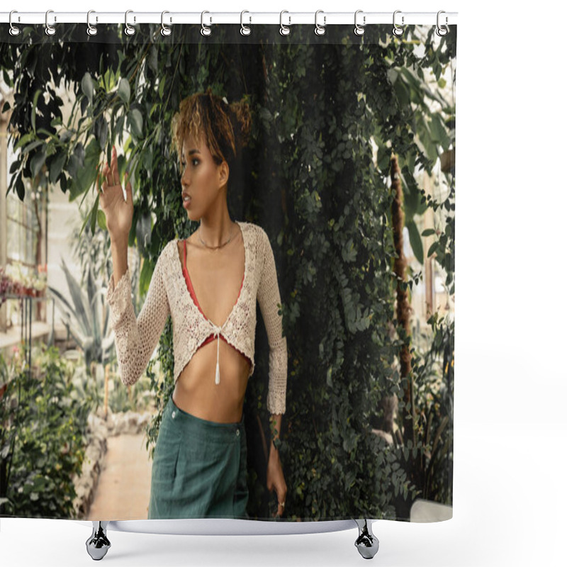 Personality  Fashionable Young African American Woman In Knitted Top And Skirt Posing While Standing Near Green Plants In Blurred Garden Center, Stylish Woman Enjoying Lush Tropical Surroundings Shower Curtains