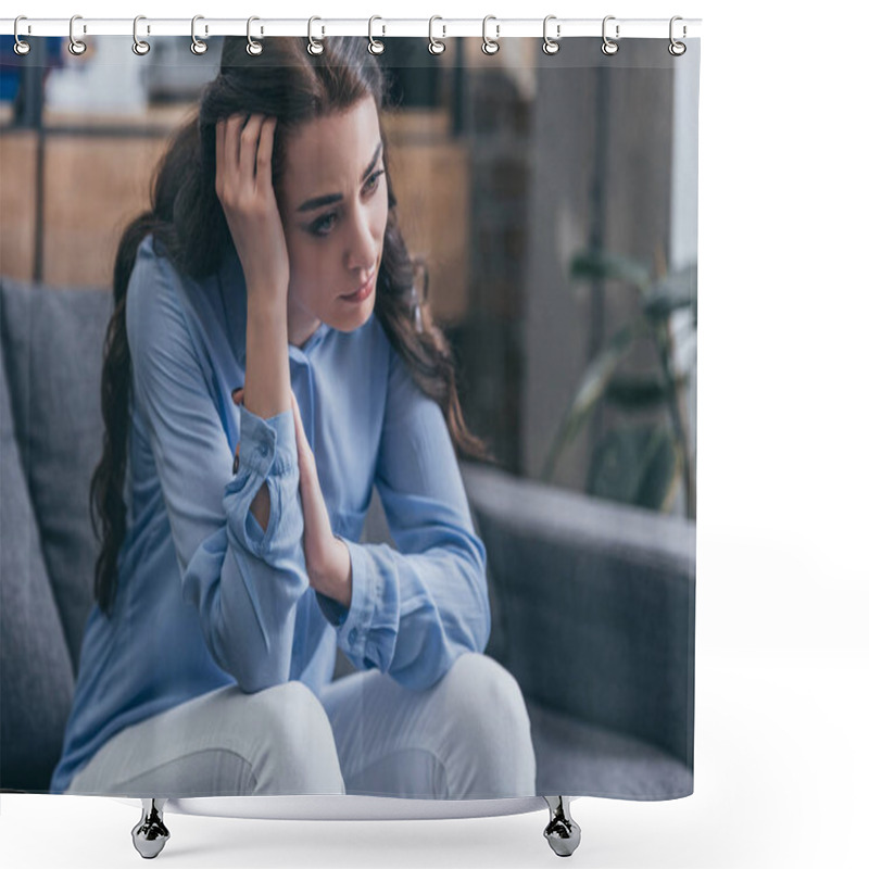 Personality  Sad Woman In Blue Blouse Sitting On Grey Couch And Looking Into Distance At Home, Grieving Disorder Concept Shower Curtains