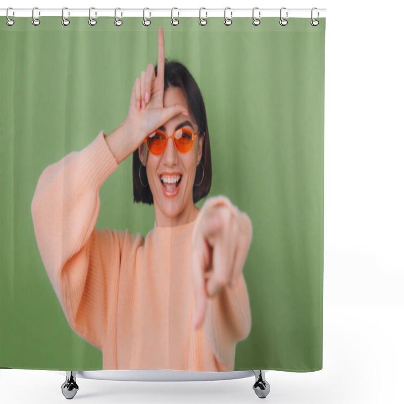 Personality  Young Woman In Casual Peach Sweater And Orange Glasses Isolated On Green Olive Background Pointing At You Mockery Fool Day Showing Horn Symbol Copy Space Shower Curtains