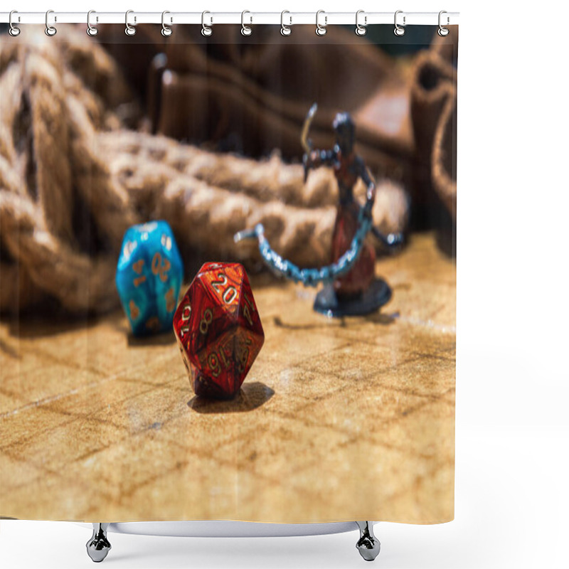 Personality  Low Angle Shot Of A Red D20 On A Battle Grid, Surrounded By A Blue D20, Gaming Mini, Rope, And Coin Bag Shower Curtains