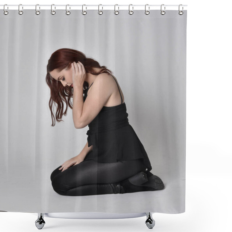 Personality  Portrait Of A Pretty Girl With Red Hair Wearing Black Leather Pants, Shirt And Boots.  Full Length Sitting Pose, Isolated Against A Studio Background Shower Curtains