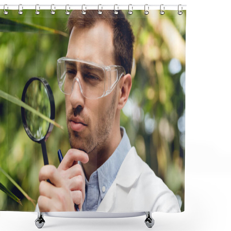 Personality  Thoughtful Scientist In White Coat And Goggles Examining Plants With Loupe In Green Orangery Shower Curtains