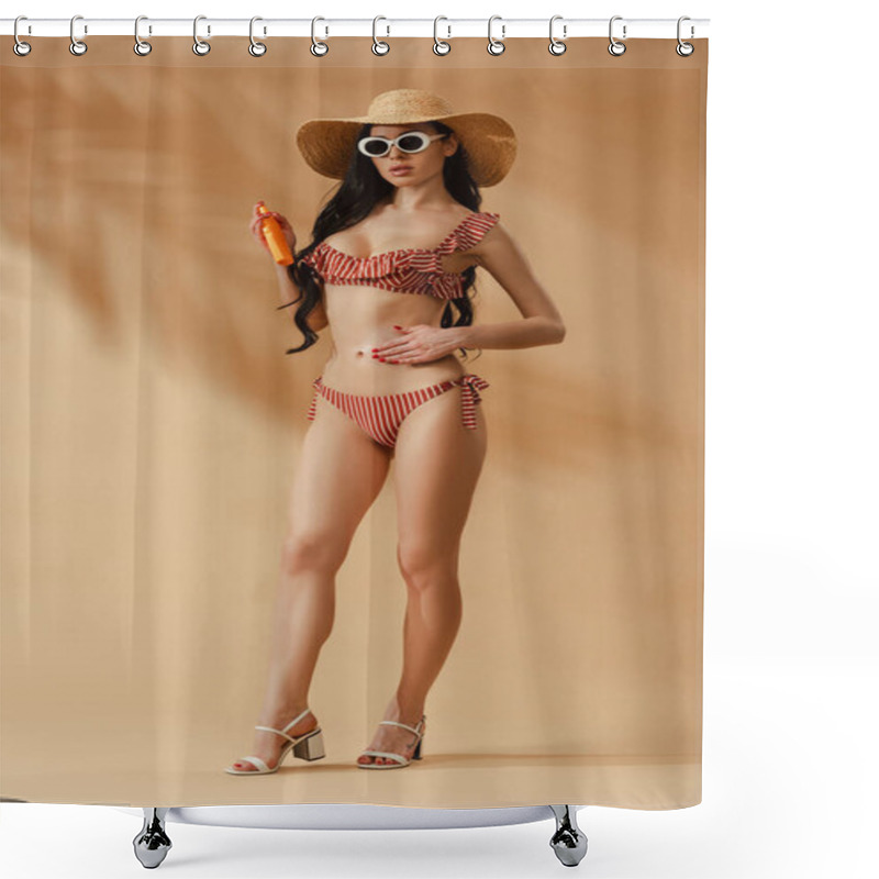 Personality  Sexy Brunette Woman In Striped Swimsuit Applying Sunscreen On Belly On Beige Background Shower Curtains