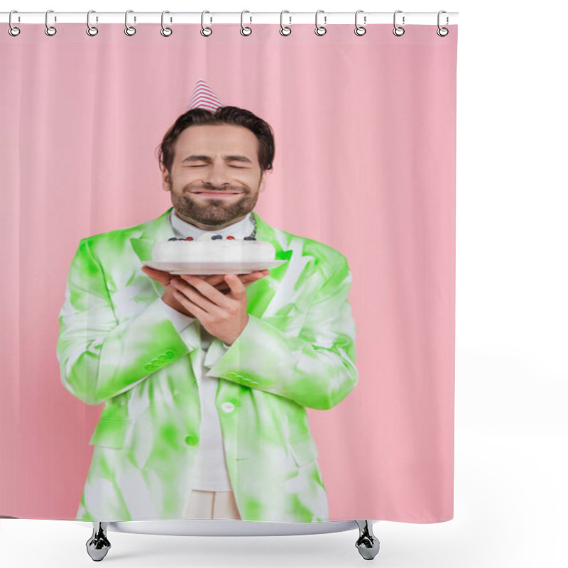 Personality  Smiling Man In Party Cap Closing Eyes While Holding Birthday Cake Isolated On Pink  Shower Curtains