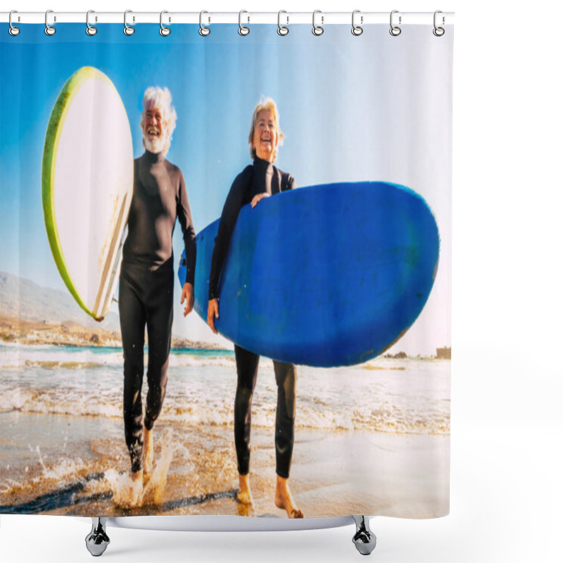 Personality  Couple Of Seniors At The Beach With Black Wetsuits Holding A Surftables Ready To Go Surfing A The Beach - Active Mature And Retired People Doing Happy Activity Together In Their Vacations Or Free Time  Shower Curtains