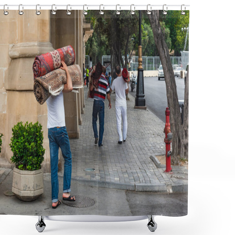 Personality  Baku/Azerbaijan - May 29. 2018. Carpet Buyers Carry Rugs Shower Curtains