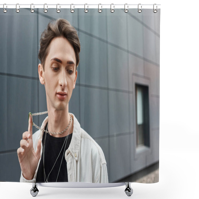 Personality  A Stylish Young Individual Holds A Necklace In Front Of A Majestic Building, Showcasing His Unique Sense Of Fashion And Pride. Shower Curtains