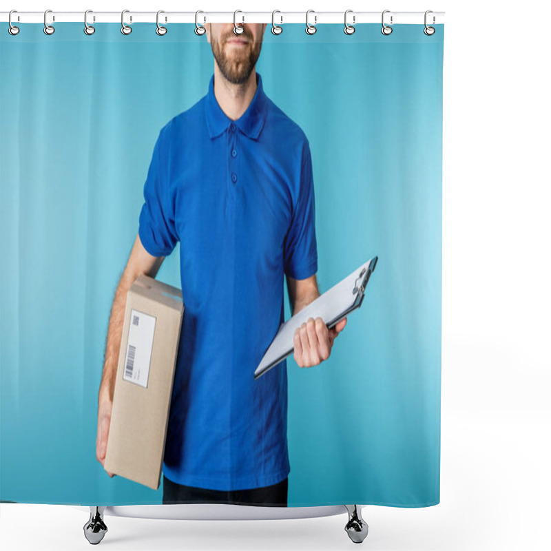 Personality  Cropped View Of Bearded Courier Holding Clipboard And Cardboard Package Isolated On Blue  Shower Curtains