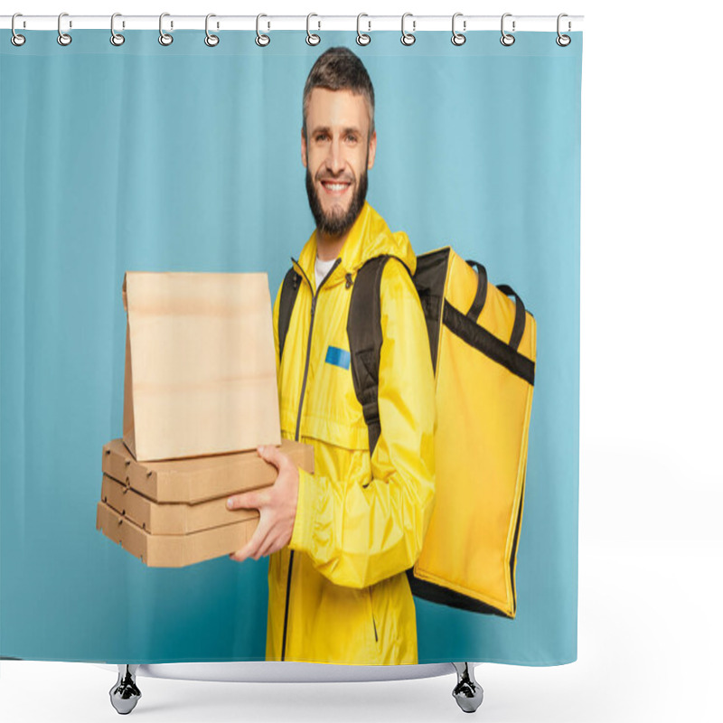 Personality  Smiling Deliveryman In Yellow Uniform With Backpack Holding Paper Package And Pizza Boxes On Blue Background Shower Curtains