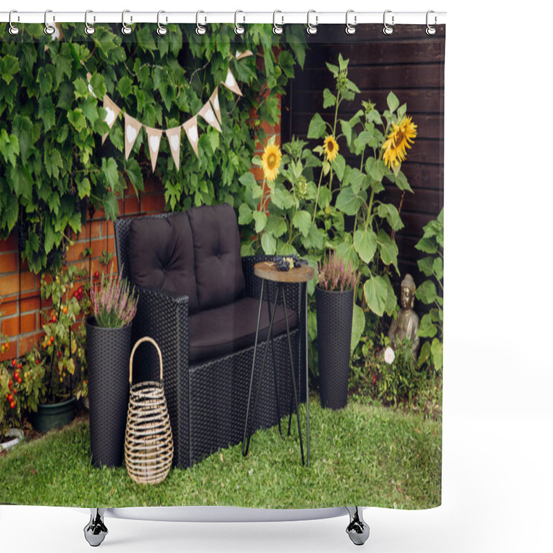 Personality  Black Modern Poly Rattan Garden Furniture Chair, Metal Wire Side Table. Green Grape Vines Plants Growing On Red Brick Wall As Decorative Element. Wood Candle Lantern Illuminated, Pink Heather Flower. Shower Curtains